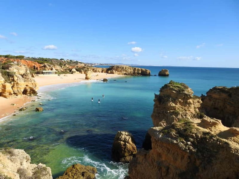 Albufeira: Caves and Beaches SUP Paddleboarding Tour - The small beach stop after 45 minutes