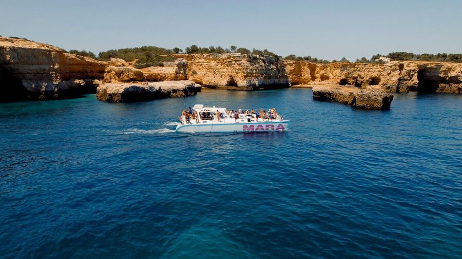 Albufeira: Caves and Coastline Catamaran Cruise to Benagil - The swimming stop and life on deck