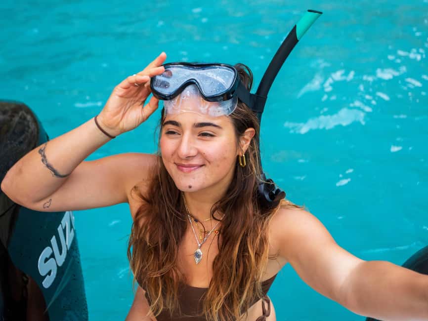 Alcudia: Sightseeing, Sea Caves & Snorkel Speedboat Tour - Music, speed, and the feel of the ride