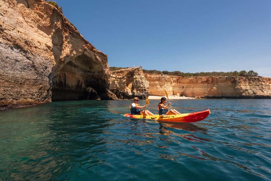 Algarve: Benagil Cave Sunrise Kayak Tour with Shower Use - Paddling along the Algarve cliffs