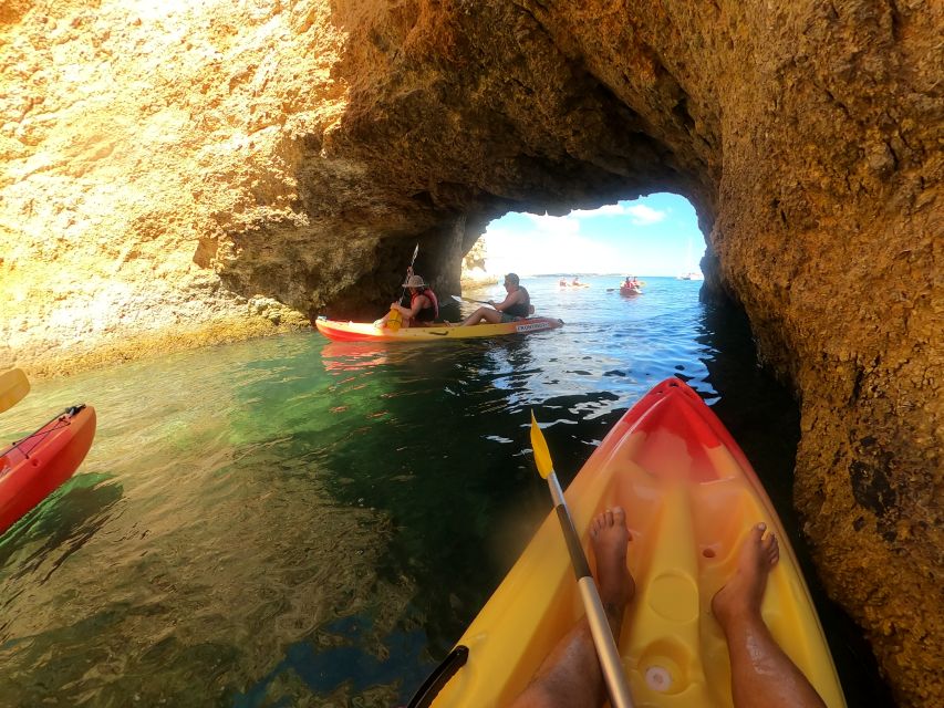 Alvor: Explore Caves Boat and Kayak Tour - The outward cruise along the Algarve coast