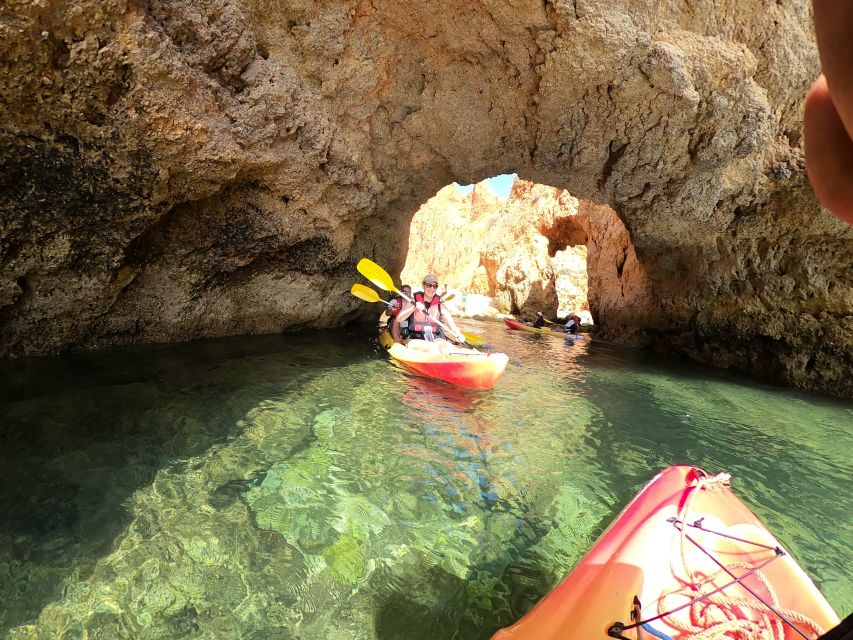 Alvor: Explore Caves Boat and Kayak Tour - Paddling toward caves and small beaches