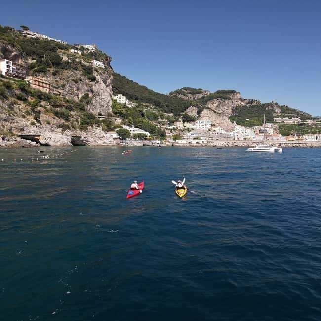 Amalfi Coast: Kayak, Snorkeling, Pandora Cave & Hidden Beach - Paddling east toward the Norman Tower