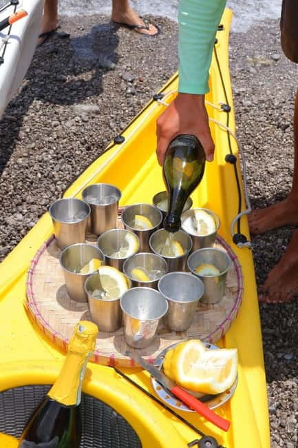 Amalfi: Kayak-Snorkel to Pandora Cave, Hidden Beach & Drinks - Paddling past Maiori’s old defenses