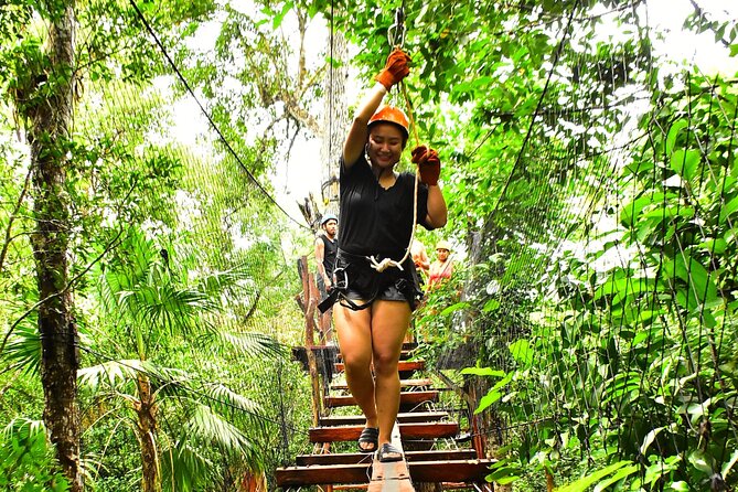 ATV Adventure, Interactive Bridges, Ziplines, Cenote and Lunch - Flying above the trees on three ziplines
