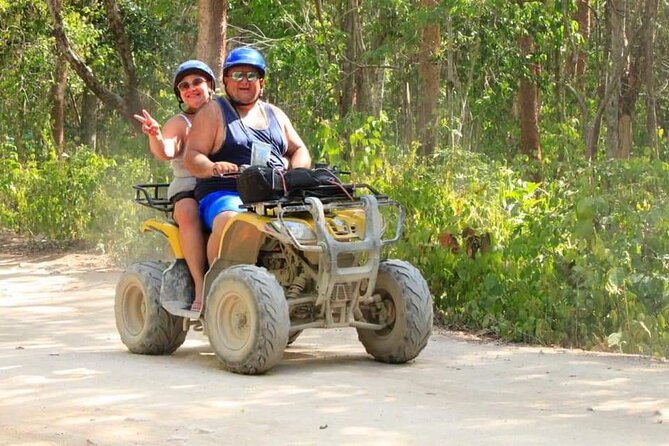 ATV Cenote and Zipline Sacred Jungle Expedition - ATV riding through the Mayan jungle