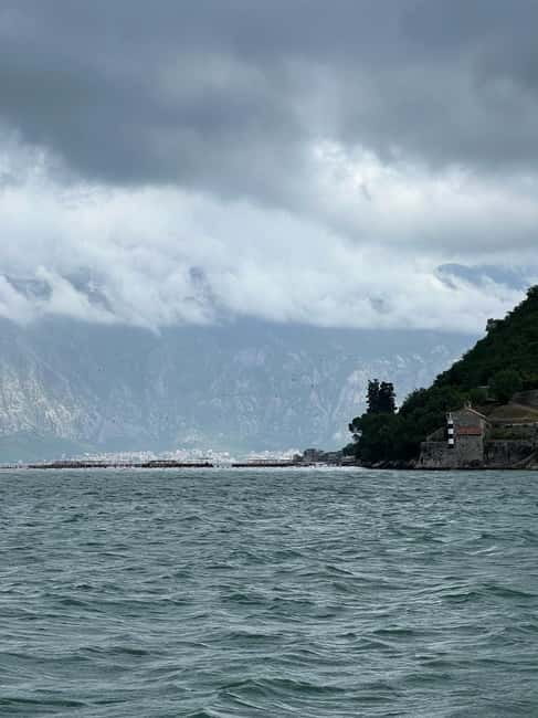 Azure Paradise: Blue Cave and Kotor Bay Boat Tour - Swimming inside the Blue Cave