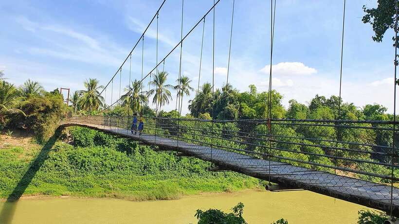 Battambang: Tuk-Tuk, Bamboo Train, Killing/Bat Caves, Sunset - Villages, plantations, rice fields, and the wooden bridge