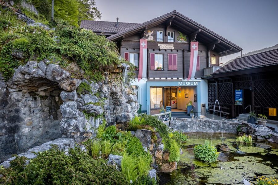 Beatenberg: Beatus Caves Entry Ticket with Museum - The waterfall, cafe, and Lake Thun views