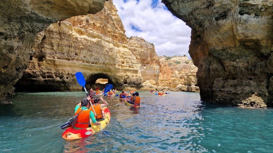 Benagil: Sunrise kayak tour Benagil caves and secret spots - Paddling along the Benagil coast