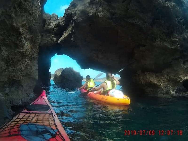 Binibèquer: Kayaking, Caves and Snorkeling Adventure - Swimming in a natural pool