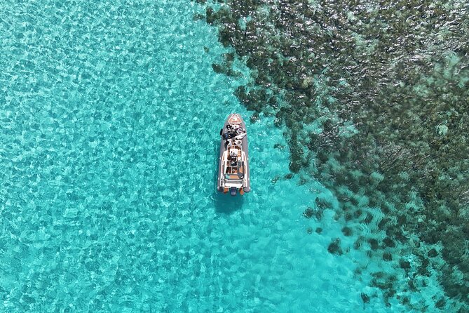 Blue Lagoon, Comino and Caves Tour with Private Rib Boat - Santa Marija Bay slows the pace