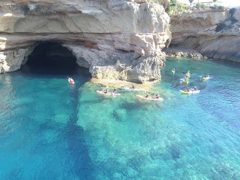 Cala Codolar: Sea & Caves Kayaking Tour with Snorkeling - Morning calm or sunset with cava