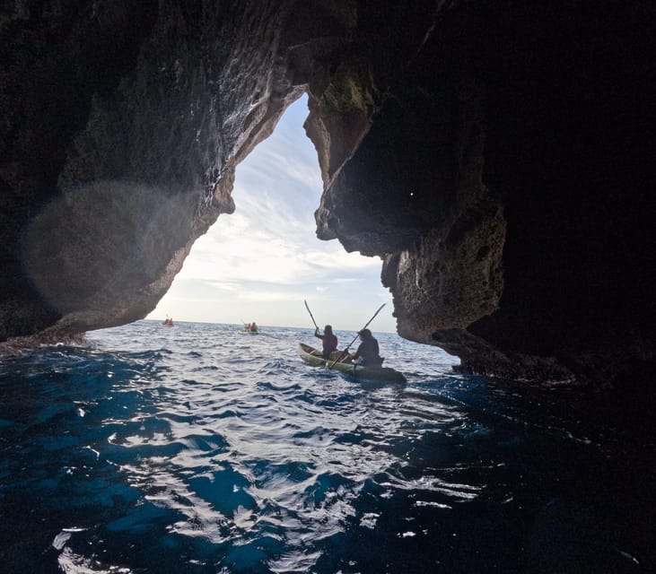 Cala en Porter: Menorca Caves Kayaking Tour & GoPro Photos - Exploring several sea caves