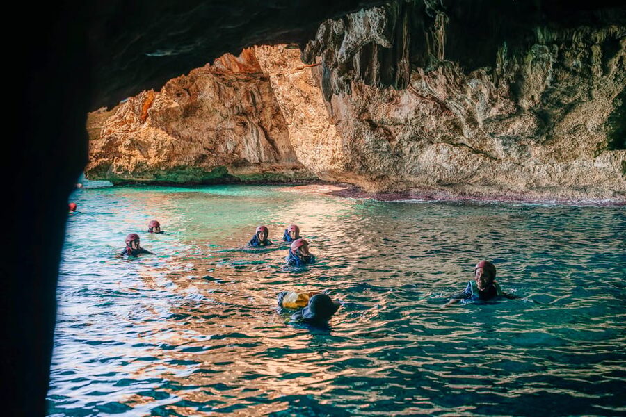 Cala Varques: Guided Sea Caves Kayak & Snorkeling Expedition - Paddling out from Estany den Mas