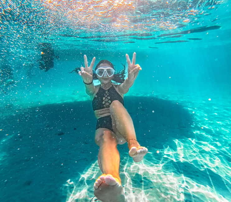 Can Picafort: 2-Hour Boat Tour with Snorkeling & Sea Caves - The ride toward Coll Baix beach