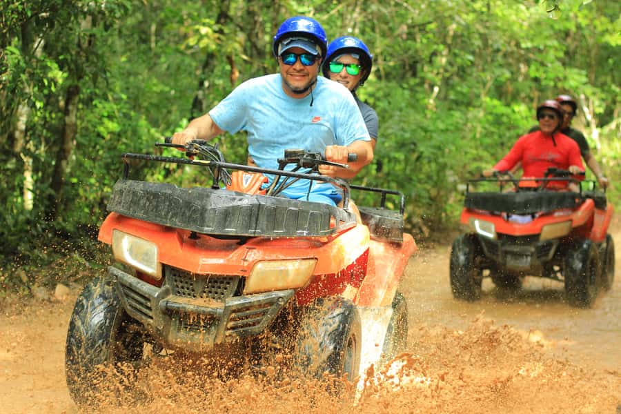 Cancún: ATV, Zipline, and Cenote Adventure with Lunch - Cooling off in an artificial cenote