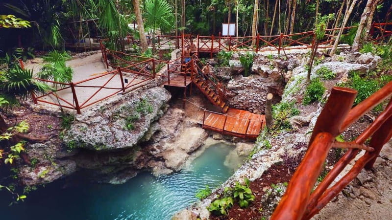Cancún: Cenotes Adventure with Tequila Tasting & Mayan Snack - Swimming through three Mayan cenotes