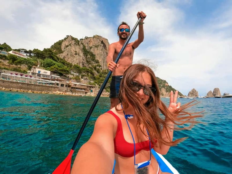 Capri: Caves and Beaches Paddle Board Tour with Photos - Along Via Krupp, with Capri’s rock walls close by