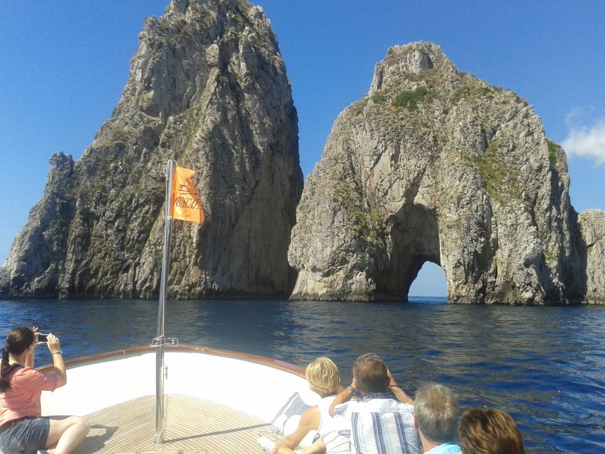 Capri: Island Boat Tour with Blue Grotto Stop - Casa Malaparte and the Faraglioni Rocks