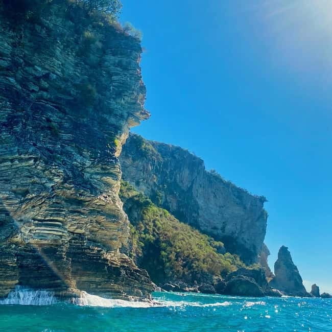 Caves of Porto Palermo: Kayak/SUP Tour with Castle Sea View - Around the cliffs to the second swimming stop