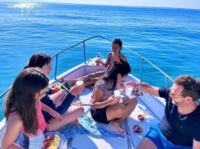 Cefalù: Mini Yacht Tour with Caves, Snorkeling, and Open Bar Aperitif - Kalura Beach and the first swim