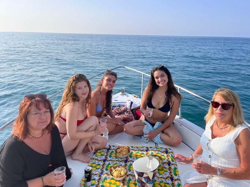 Cefalù: Mini Yacht Tour with Caves, Snorkeling, and Open Bar Aperitif - The onboard aperitivo and open bar