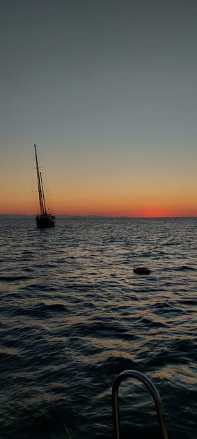 Cefalù: Mini Yacht with Snorkel Stops, Caves and Aperitif - The opening cruise past Cefalù Beach