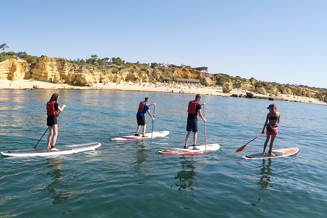 Cliffs & Caves Stand Up Paddle Adventure - Passing the smaller beaches