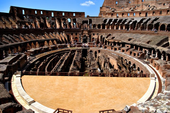 Colosseum Underground & Ancient Rome Guided Tour - Entering the Colosseum through the arena