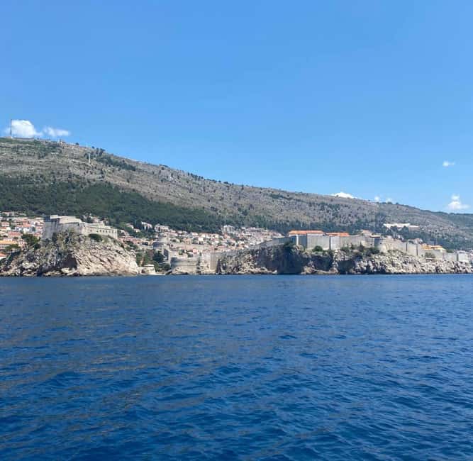 Dubrovnik: GlassBoat Panorama/Sunset Tour with Guide & Caves - Seeing the Old City Walls from the sea