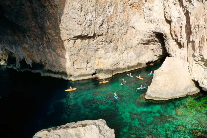 Explore Malta’s Blue Grotto by SUP - Paddling Along Blue Grotto Bay