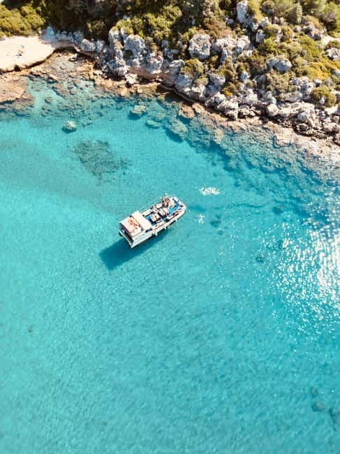 Faliraki: Boat Trip to Anthony Quinn & The Caves with Drinks - Boarding from Faliraki beach