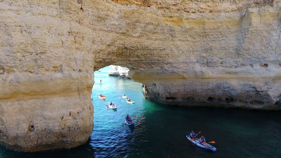 From Albufeira: Benagil Hidden Caves Tour by Kayak - The swim and boat ride back