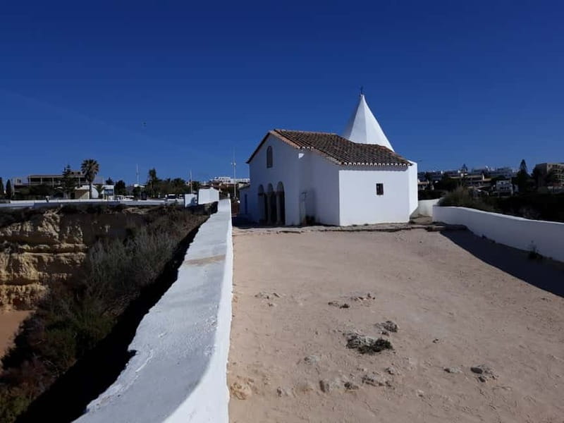 From Albufeira: Tuk-Tuk Tour to Benagil Caves - Our Lady of the Rock gives the first big view