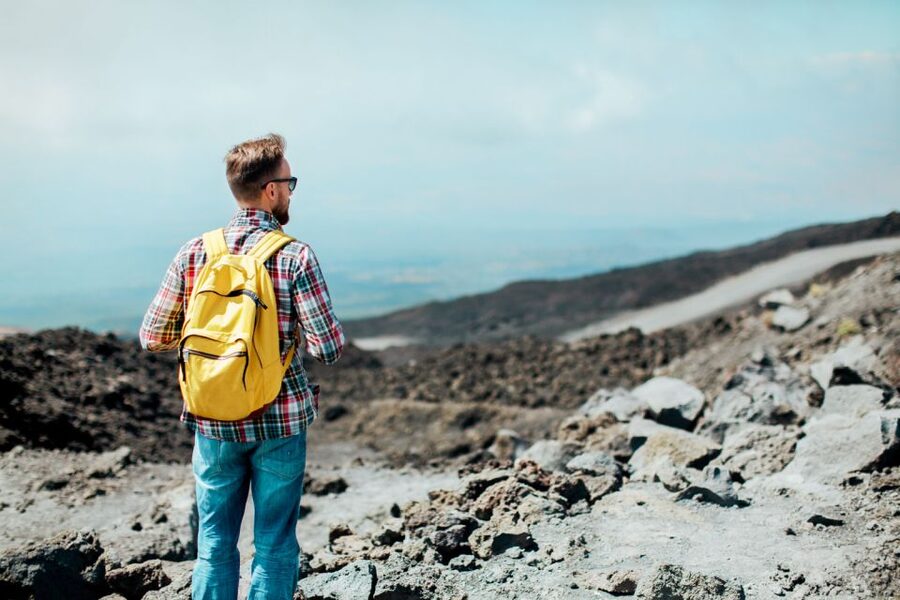 From Catania: trek on Mount Etna, Lava Cave & tasting Tour - Walking the extinct craters at 1,986 meters