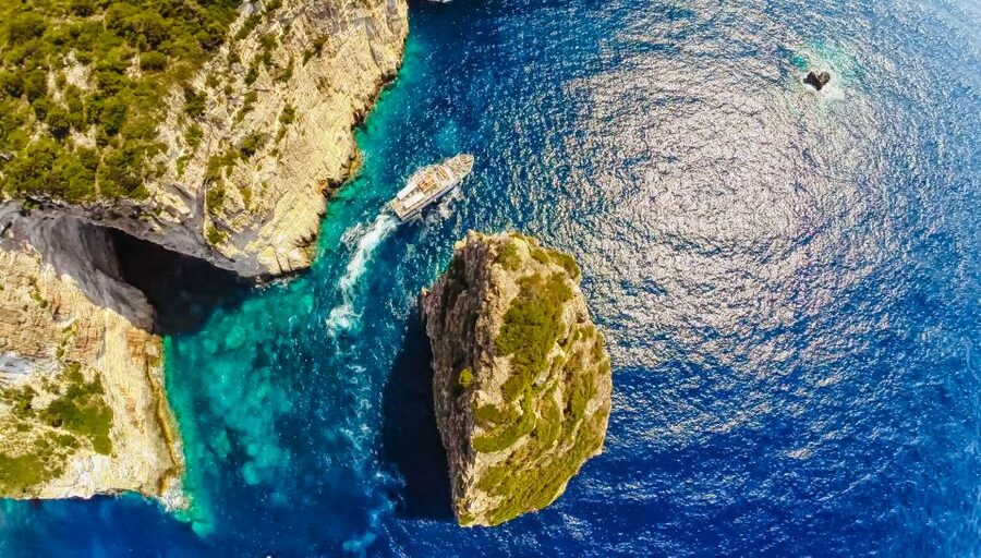 From Corfu: Day Cruise to Paxos, Antipaxos, and Blue Caves - The narrow channel and Gaios village