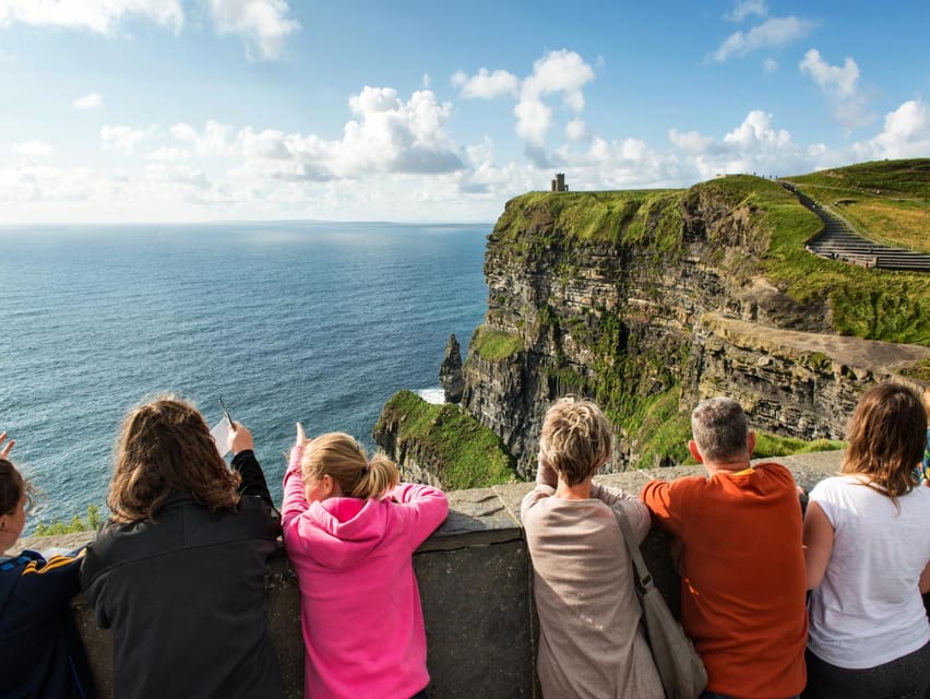 From Dublin: Cliffs of Moher, Boat Tour & Aillwee Cave - Standing above the Cliffs of Moher