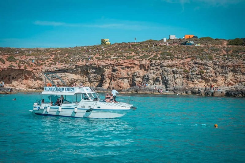 From Gozo:Around Comino, Blue Lagoon, Crystal Lagoon & Caves - The Blue Lagoon: beautiful, famous, and crowded
