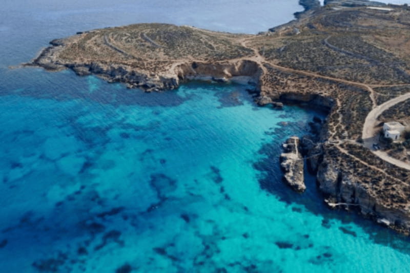 From Gozo:Around Comino, Blue Lagoon, Crystal Lagoon & Caves - Comino’s caves and rocky coast