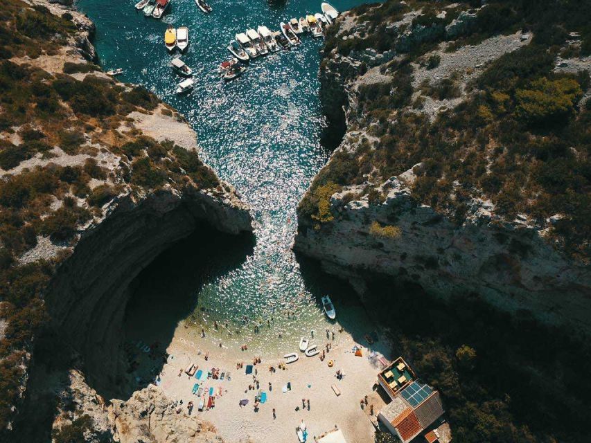 From Hvar: Vis Island and Blue Cave Speedboat Tour - Stiniva Beach and the long swim ashore