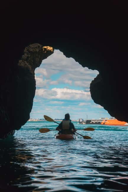 From Lagos: Ponta da Piedade Caves Kayak Tour from Catamaran - The swim, sun, and boat slide