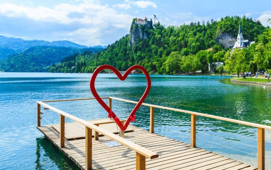 From Ljubljana: Lake Bled & Postojna Cave with Entry Tickets - Lake Bled: island, castle, and cream cake