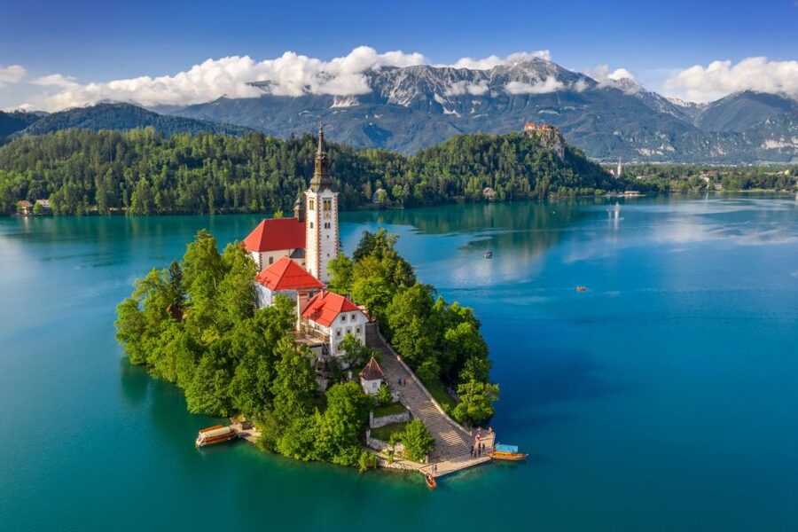 From Ljubljana: Lake Bled & Postojna Cave with Entry Tickets - Bled Castle above the lake