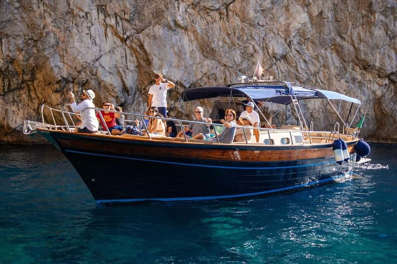 From Sorrento: Capri Boat Tour with Blue Grotto Visit - The return ride and what the crew adds