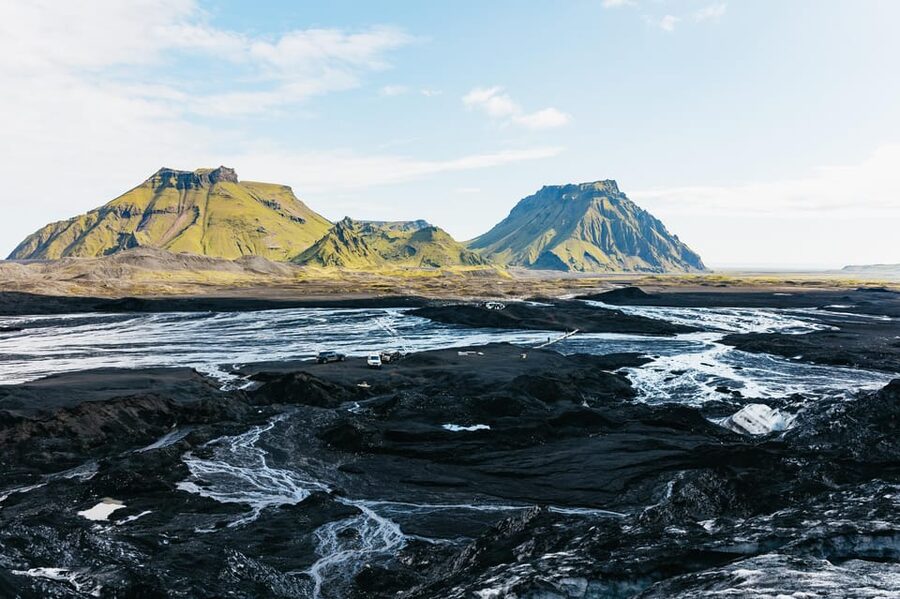 From Vik: Katla Ice Cave and Super Jeep Tour - Inside Katla Ice Cave: blue ice and frozen ash