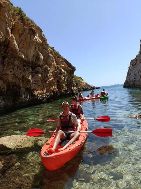 Gozo: 1 Hour Kayak plus +Cave Tour + Drop off Blue Lagoon - Riding through Santa Maria Caves