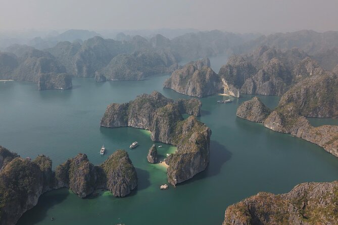 Ha Long Bay Cruise Day Tour - Cave, Kayaking, Swimming & Lunch - Kayaking through Hang Luon Cave
