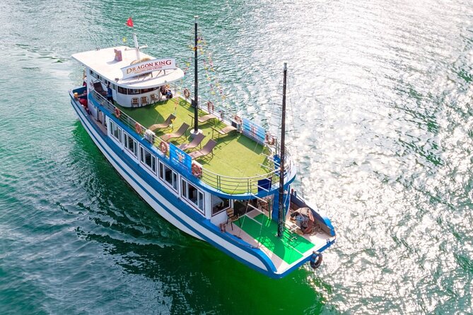 Halong Bay Day Tour With Titop Island, Cave, Kayak & Lunch - Kayaking or bamboo boat through the Luon area