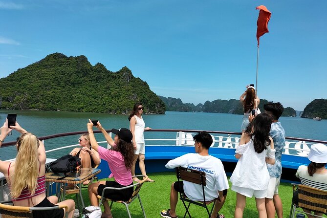 Halong Bay Day Tour With Titop Island, Cave, Kayak & Lunch - Sunset snacks and the ride back
